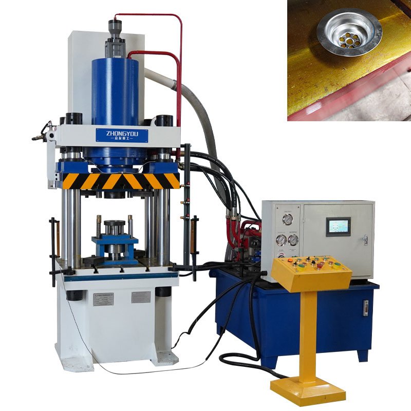 200-metric-ton metal press used for forming stainless steel floor drains